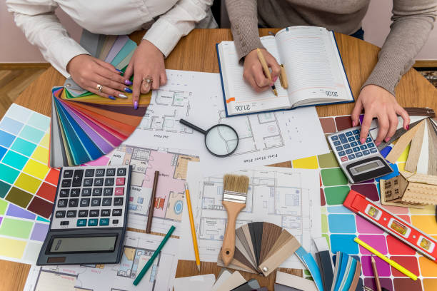istock Teamwork of creative designers working with colour palette 1126520199