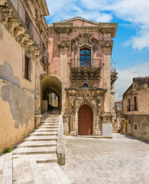 Photo of The baroque facade of the Palazzo della Cancelleria in Ragusa Ibla. Sicily, southern Italy.