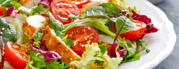 istock Fresh vegetable salad with grilled chicken meat 1126530185