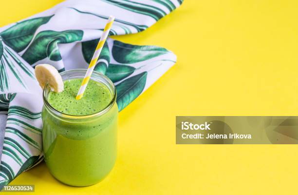 Green Spinach Smoothies In Jar With Chia Seeds Healthy Food Concept Breakfast Yellow Background Stock Photo - Download Image Now