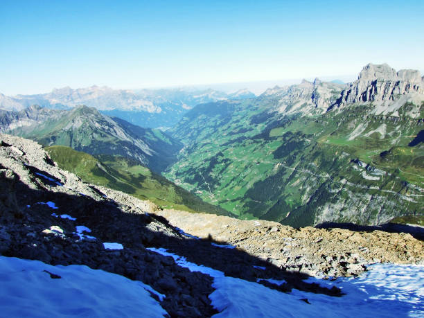 istock Alpine valley with ecological pastures Schachental 1126531809