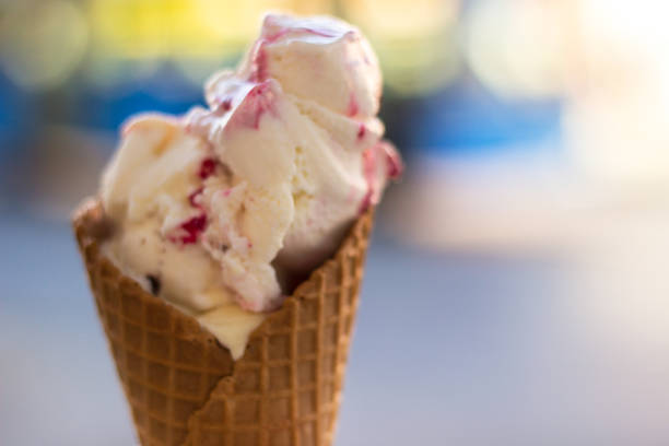 istock Woman eating ice cream 1126535450