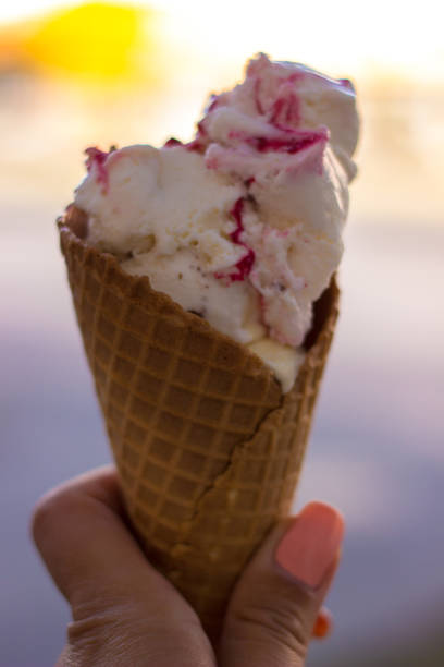 istock Woman eating ice cream 1126535743