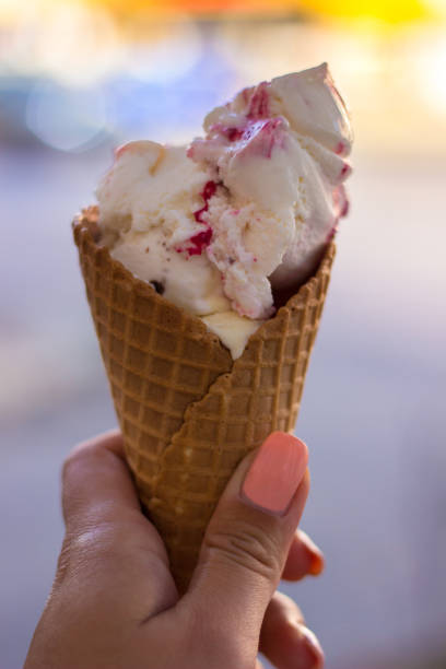 istock Woman eating ice cream 1126535950