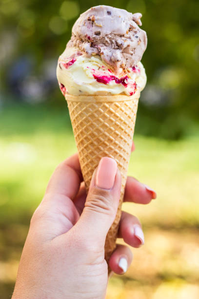 istock Woman eating ice cream 1126536542