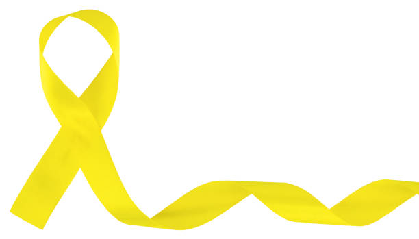 yellow ribbon-childhood cancer awareness symbol, isolated on white stock photo