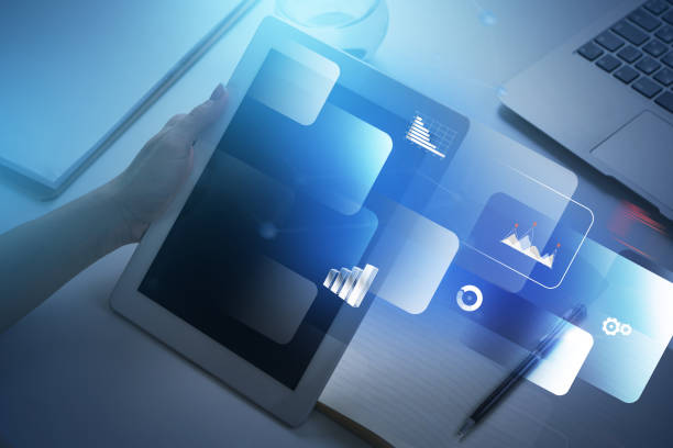 istock Woman hand with tablet, infographics 1126543950
