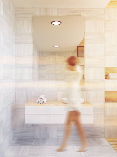istock White wood bathroom interior, sink, woman 1126544016