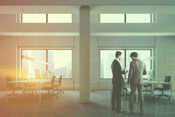 istock Side view of industrial style office, people 1126544912