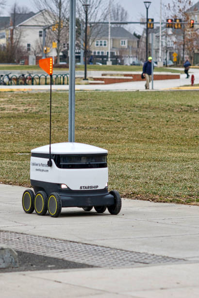 delivery robot at george mason university - george mason imagens e fotografias de stock