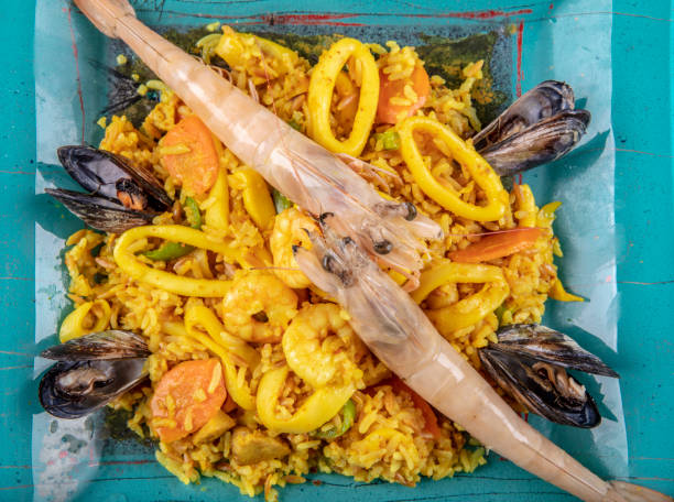 istock Seafood dinner: gumbo style crab and crawfish (shrimp) with saffron rice. 1126555381