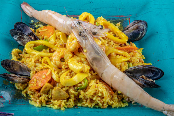 istock Seafood dinner: gumbo style crab and crawfish (shrimp) with saffron rice. 1126558532