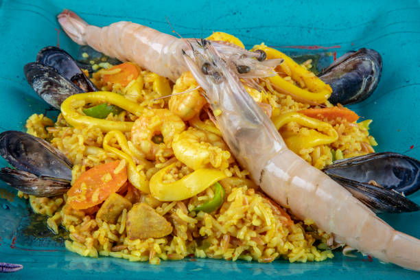 istock Seafood dinner: gumbo style crab and crawfish (shrimp) with saffron rice. 1126559605