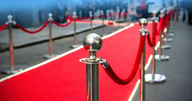 Photo of red carpet and barrier on entrance