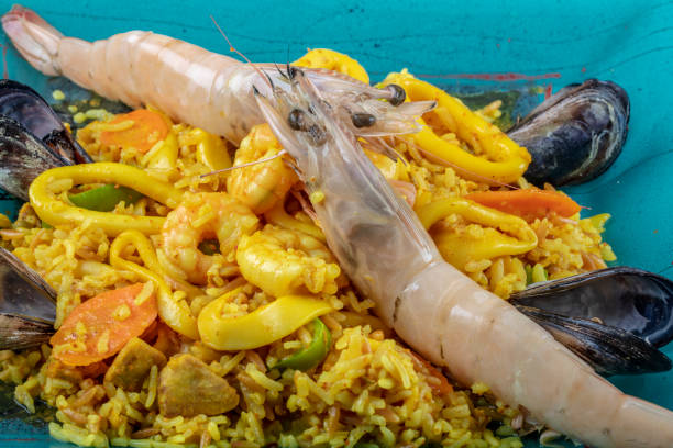 istock Seafood dinner: gumbo style crab and crawfish (shrimp) with saffron rice. 1126559822