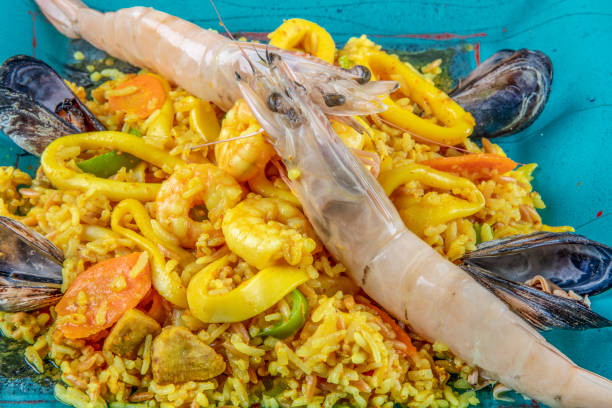 istock Seafood dinner: gumbo style crab and crawfish (shrimp) with saffron rice. 1126561385