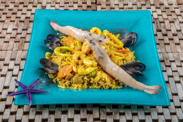 istock Seafood dinner: gumbo style crab and crawfish (shrimp) with saffron rice. 1126562041