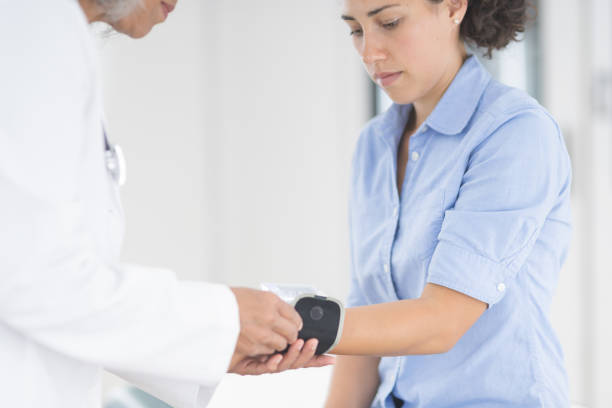 istock Doctor checking patient's blood pressure 1126571880