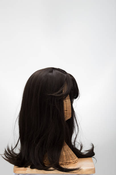 artificial fake hair wig on rattan head mannequin - fake rattan imagens e fotografias de stock