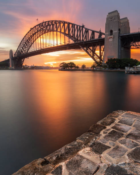 シドニー港橋の夕日 - sydney australia australia sydney harbor sydney harbor bridge ストックフォトと画像