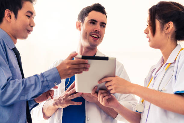 istock Group of scientists wearing lab coat working in laboratory 1126584510