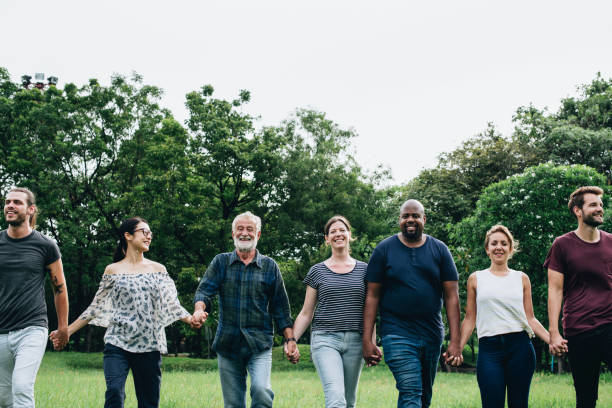 istock Happy diverse people enjoying in the park 1126588902