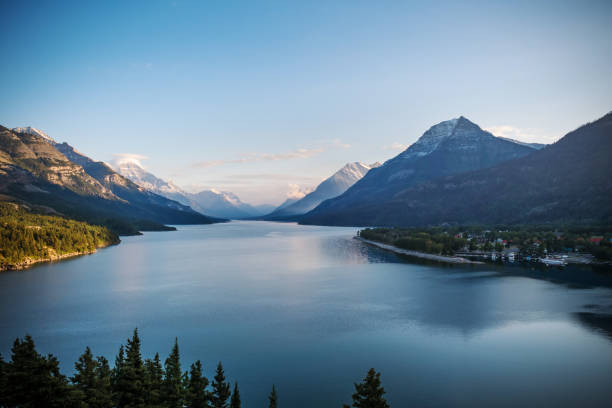 View of scenic Waterton Lake and majestic mountains from Prince of Wales lookout, Waterton Lakes National Park, Alberta, Canada, at sunset