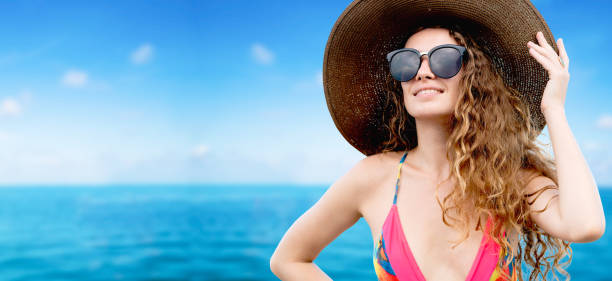istock Happy young woman wearing swimsuit 1126591608