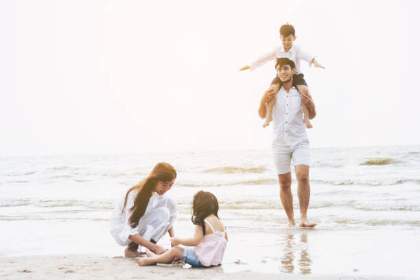 istock Family on the beach. 1126591609