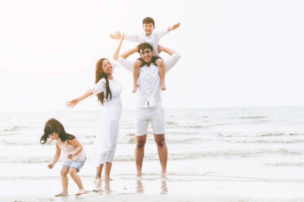 istock Family on the beach. 1126591611