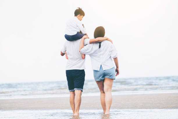 istock Family on the beach. 1126591615