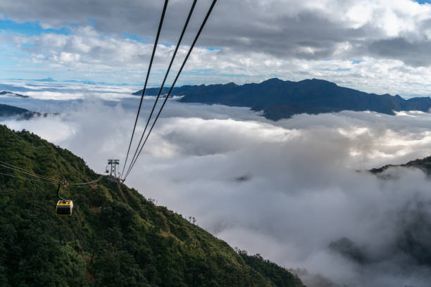 istock The cable car to mountain top with low clouds and mountain view 1126599315
