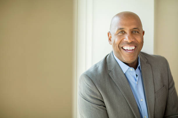 istock Happy mature African American man at work. 1126600071
