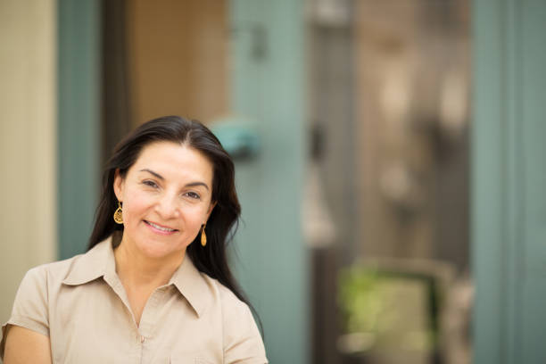 istock Happy Hispnaic woman smiling 1126600754
