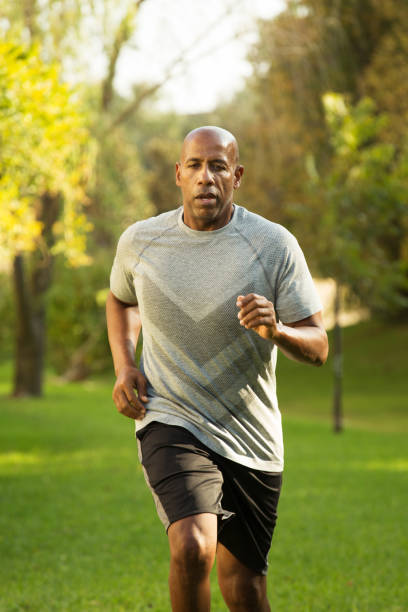 istock Fit African American man running. 1126605412