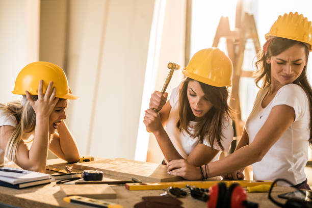 istock Watch out, you'll hit too hard with that hammer! 1126612856