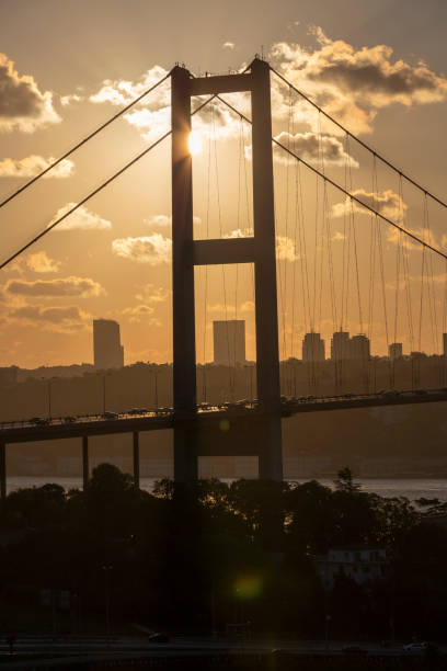 the bosphorus bridge at sunset, istanbul the bosphorus bridge at sunset, istanbul bogaz stock pictures, royalty-free photos & images