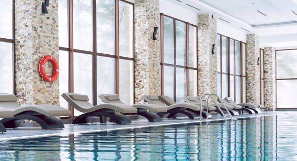 istock Indoor swimming pool in luxury hotel 1126613907