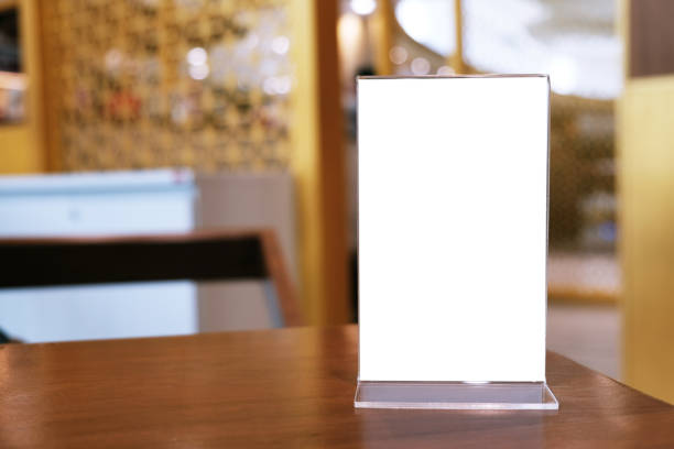 istock Menu frame standing on wood table in Bar restaurant cafe. space for text marketing promotion. 1126615138