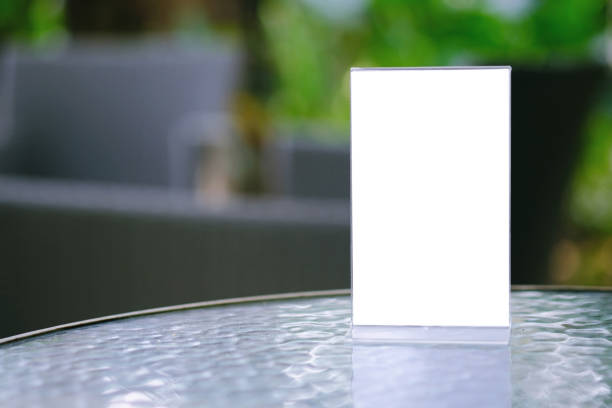 istock Menu frame standing on wood table in Bar restaurant cafe. space for text marketing promotion . 1126615169