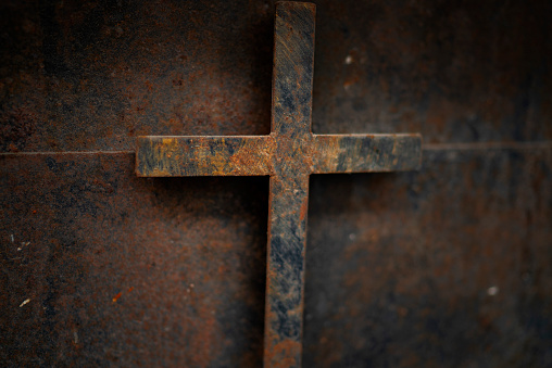 rusty cross - old and rusty cross iron door – rusty grunge background