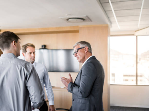 istock Business executive explaining coworkers in meeting 1126620007