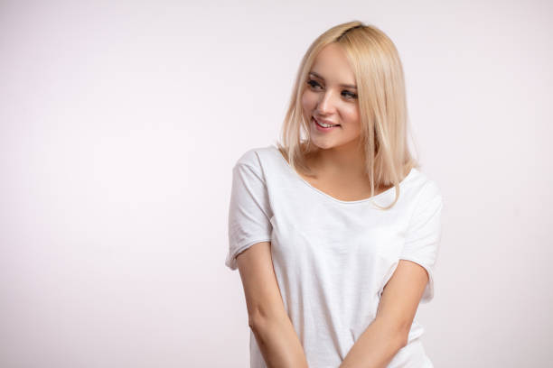 istock blond female teenager looking aside 1126620167