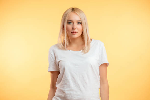 istock blond girl wearing white T-shirt 1126620169