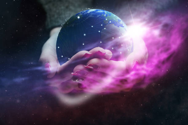 istock Protect our world in woman hands and network. Nebula dust. Mixed media. 1126621380