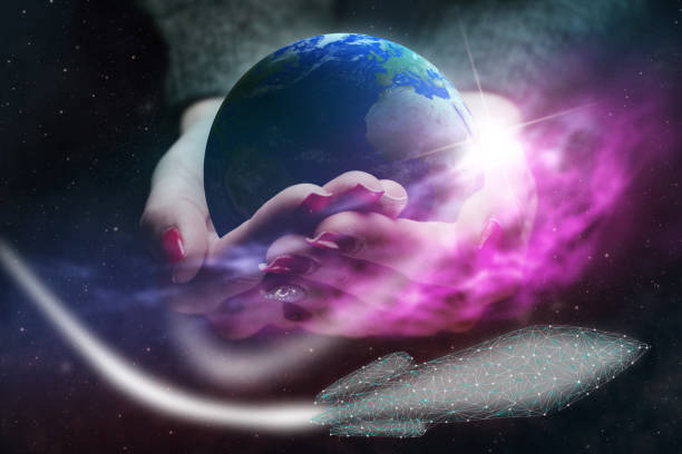 istock Protect our world in woman hands and rocket.  Nebula dust. Mixed media. 1126621718