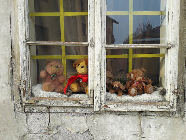 istock Old toys on the window 1126622424