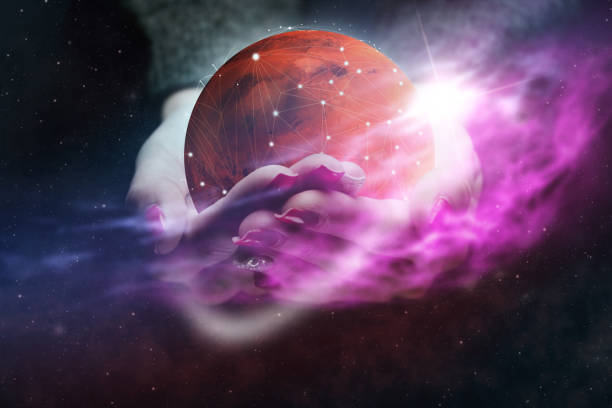 istock Woman hand hold New Home Mars and web. Nebula dust. Mixed media. 1126622448