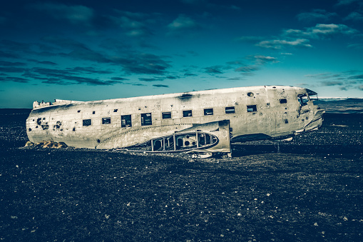 United States Navy Douglas DC-3 plane wreckage (from 1973) on the black beach at Solheimasandur, in the south coast of Iceland. Photo taken by Sony a7R II, 42 Mpix.