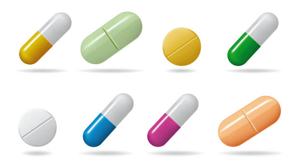 medizinische tabletten. tabletten in verschiedenen farben gesetzt. isolierte objekte auf weißem hintergrund - painkiller pill capsule birth control pill stock-grafiken, -clipart, -cartoons und -symbole